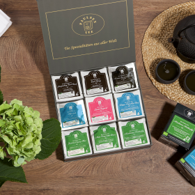 Preview: Exklusive Bio-Tee Geschenkbox mit 9 verschiedenen schwarzen, grünen & weißen Tees,  45 Pyramiden (135g), einzeln kuvertiert